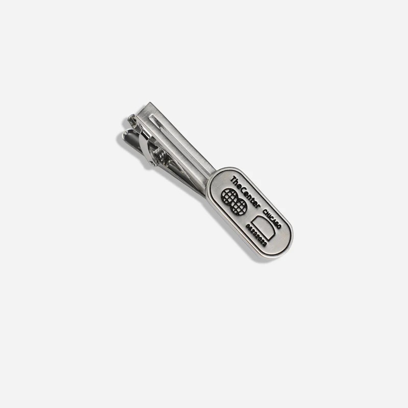 The Center of Order and Experimentation x The Tie Bar The Indicator Brushed Silver Tie Bar