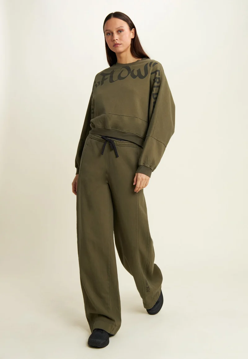 Wide leg fleece trousers with Flow print